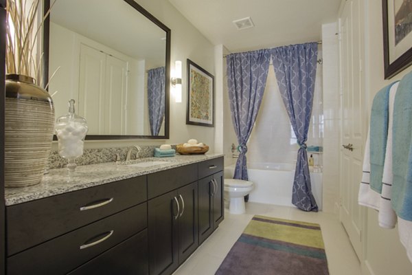 Luxurious bathroom featuring modern fixtures in The Michael at Presidio Apartments