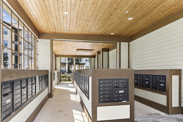 Mail room with secure parcel lockers at The Michael at Presidio Apartments