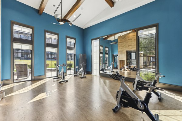 State-of-the-art fitness center at The Michael at Presidio Apartments with modern equipment for a superior workout experience