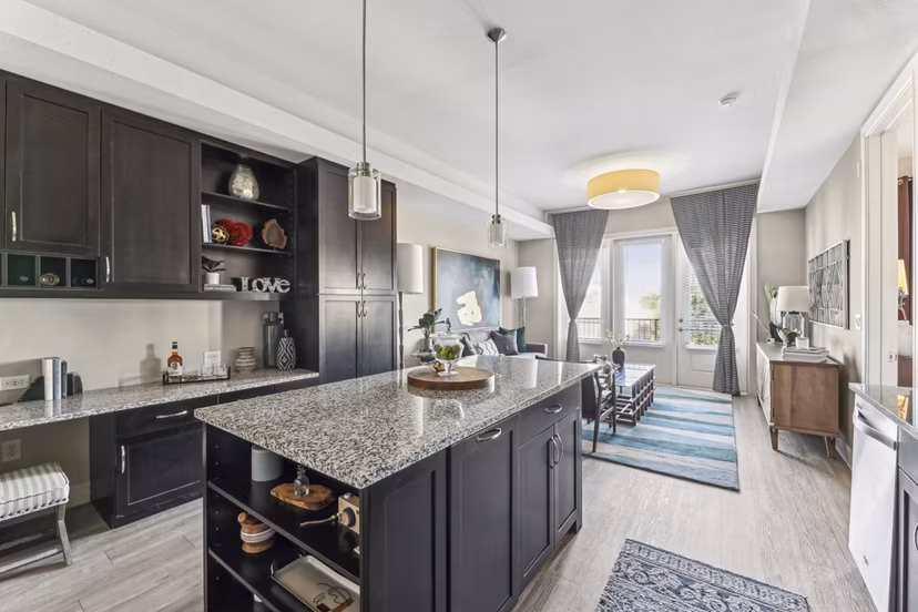 Modern kitchen with stainless steel appliances at The Michael at Presidio Apartments, a Greystar luxury apartment community