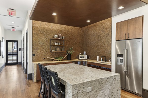 Contemporary kitchen with stainless steel appliances at The Michael at Presidio Apartments in San Francisco