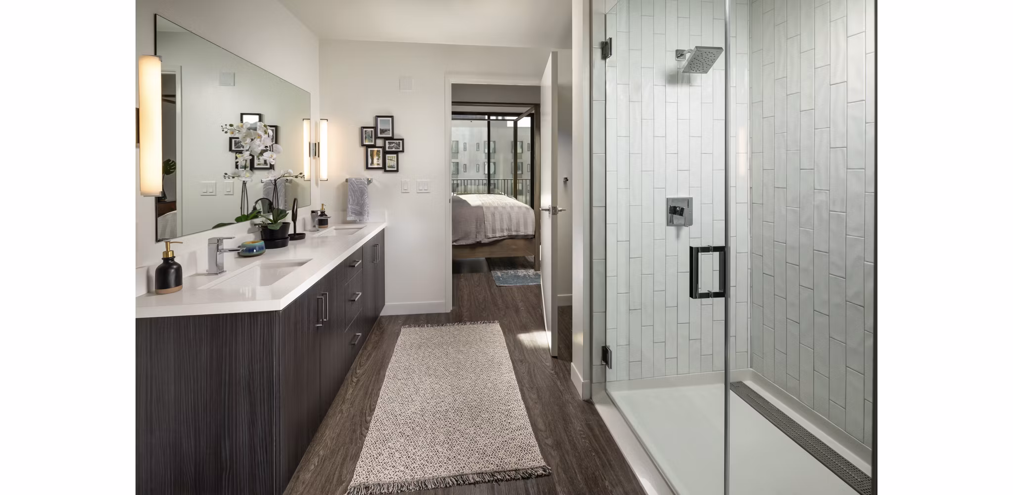 Pierside South Apartments: Elegant bathroom featuring modern fixtures and marble countertops