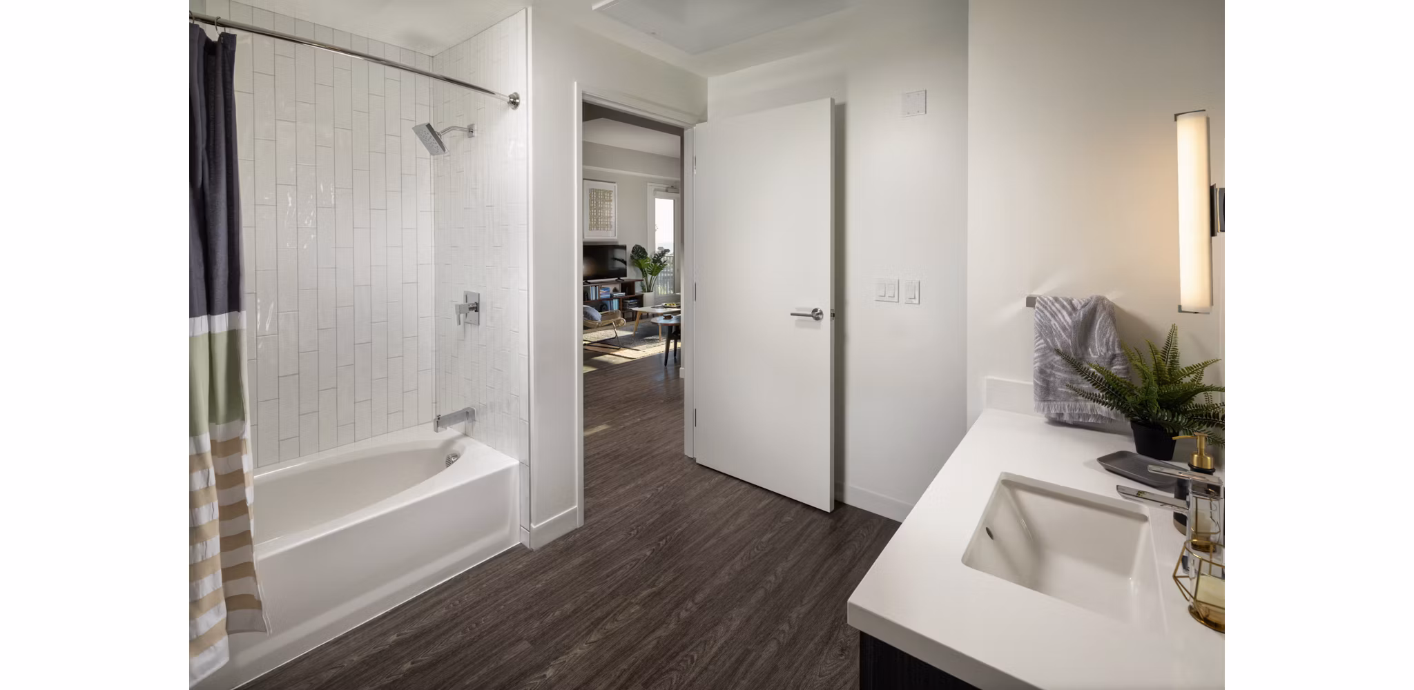Luxury bathroom with modern fixtures at Pierside South Apartments