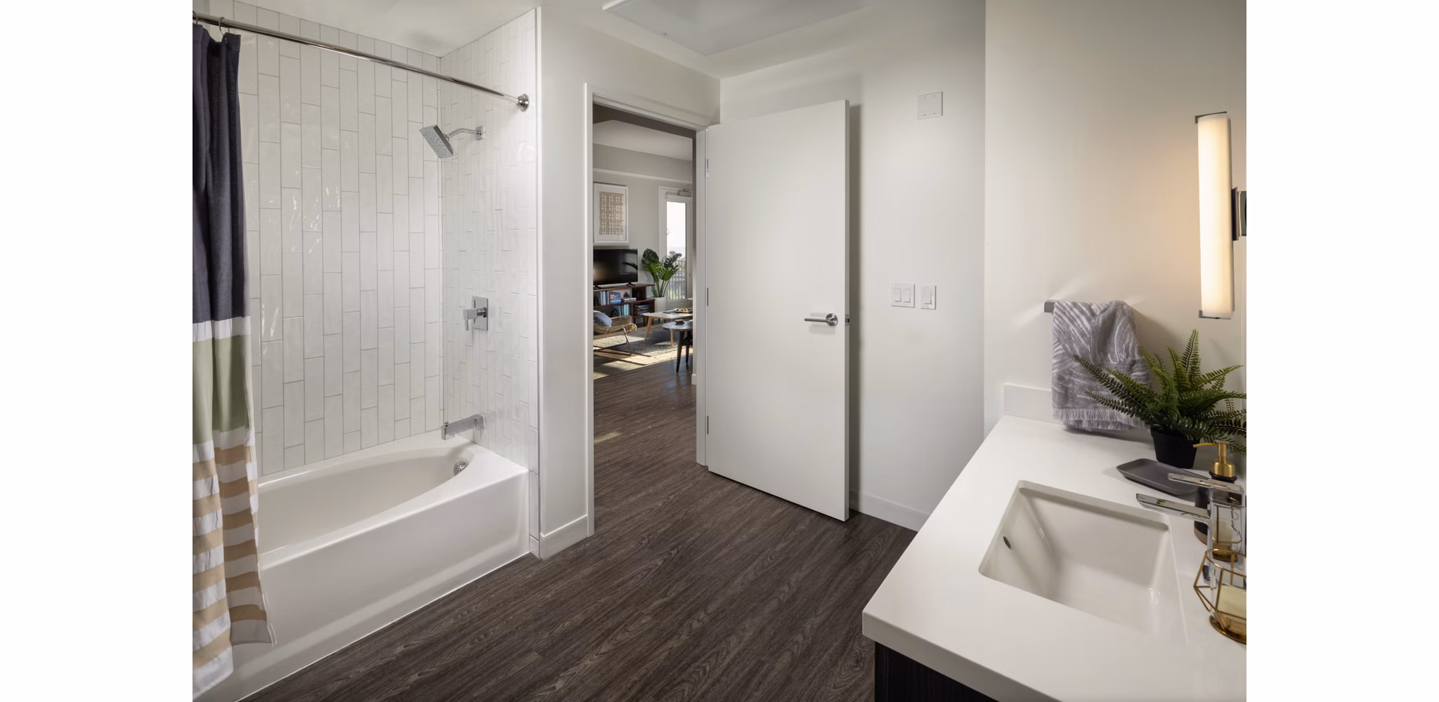 Luxury bathroom with modern fixtures at Pierside South Apartments