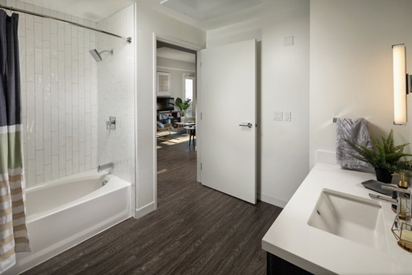 Luxury bathroom with modern fixtures at Pierside South Apartments