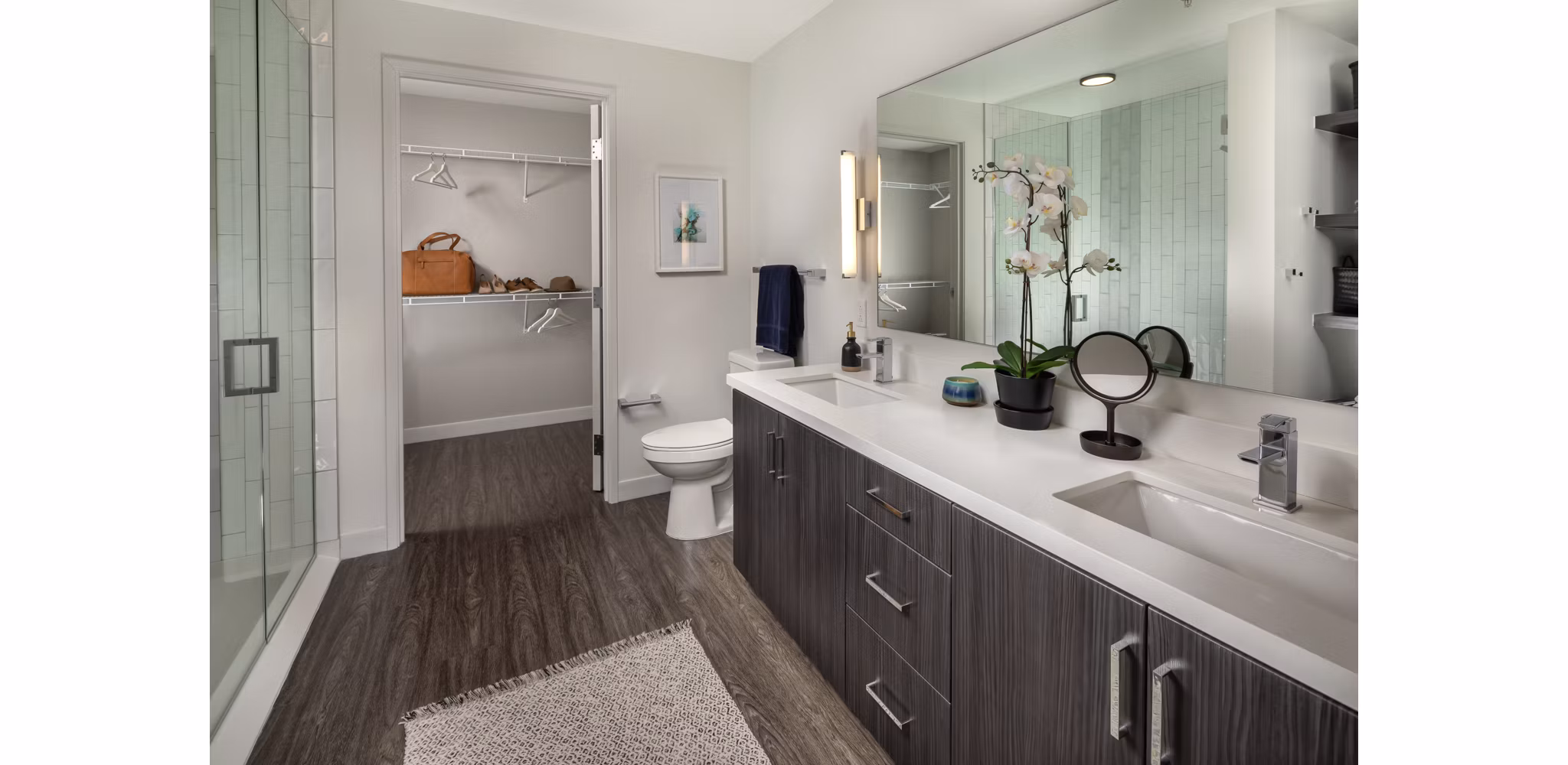 Pierside South Apartments: Modern bathroom with sleek fixtures and elegant lighting