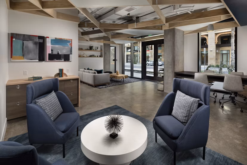 Clubhouse featuring modern design and cozy seating at Pierside South Apartments in a Greystar luxury community