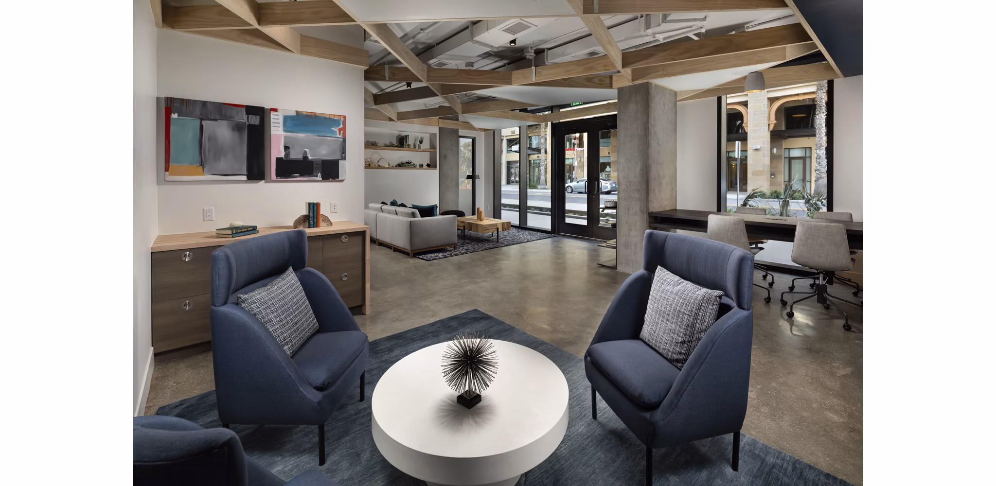 Clubhouse featuring modern design and cozy seating at Pierside South Apartments in a Greystar luxury community