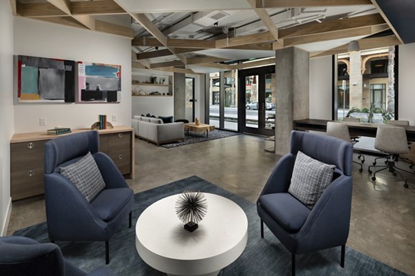Clubhouse featuring modern design and cozy seating at Pierside South Apartments in a Greystar luxury community