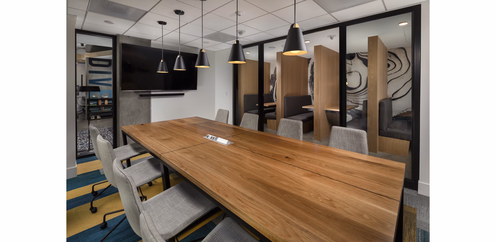 Modern meeting facility with ergonomic seating at Pierside South Apartments, a luxury offering for residents seeking convenience and comfort