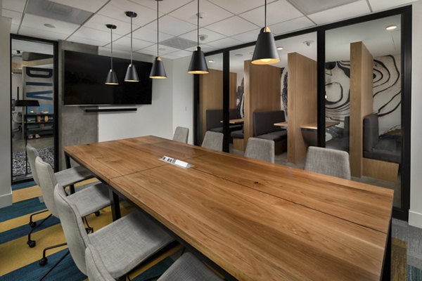 Modern meeting facility with ergonomic seating at Pierside South Apartments, a luxury offering for residents seeking convenience and comfort
