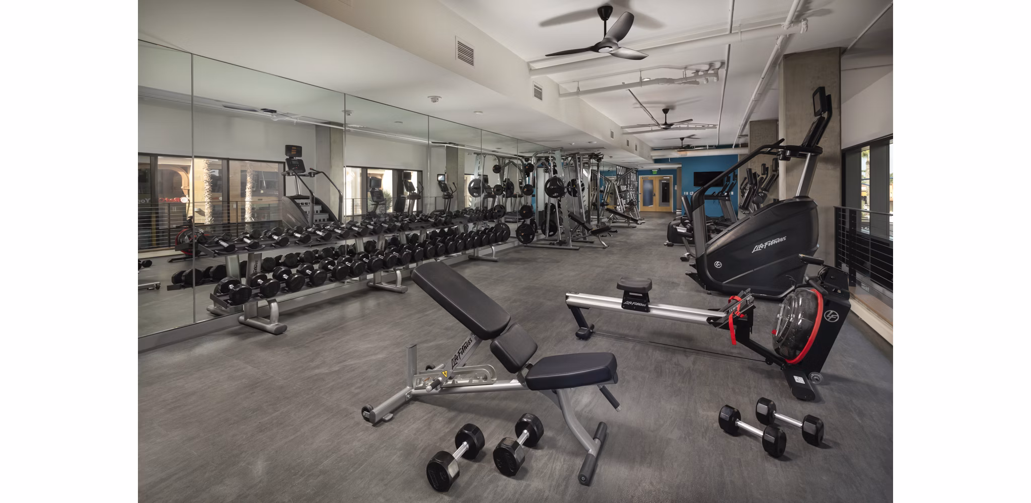 Modern fitness center with state-of-the-art equipment at Pierside South Apartments