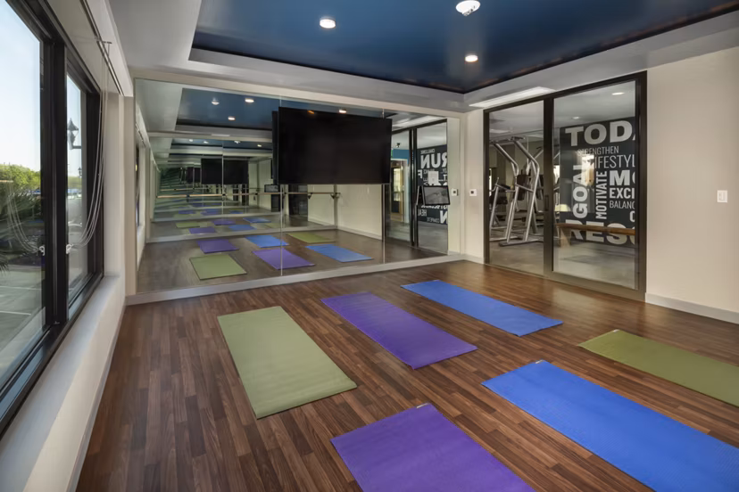 Tranquil yoga area with natural light at Pierside South Apartments