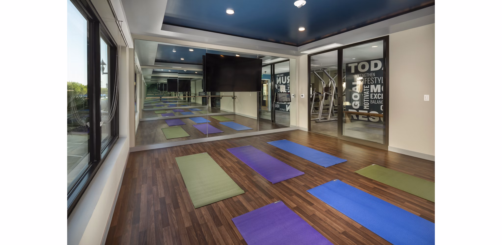 Tranquil yoga area with natural light at Pierside South Apartments