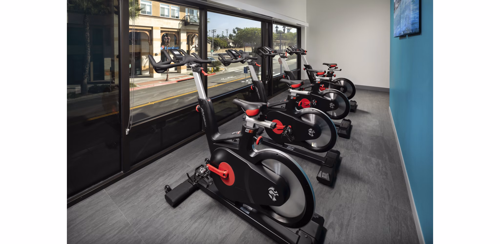 Modern fitness center with spin bikes at Pierside South Apartments, ideal for an active lifestyle