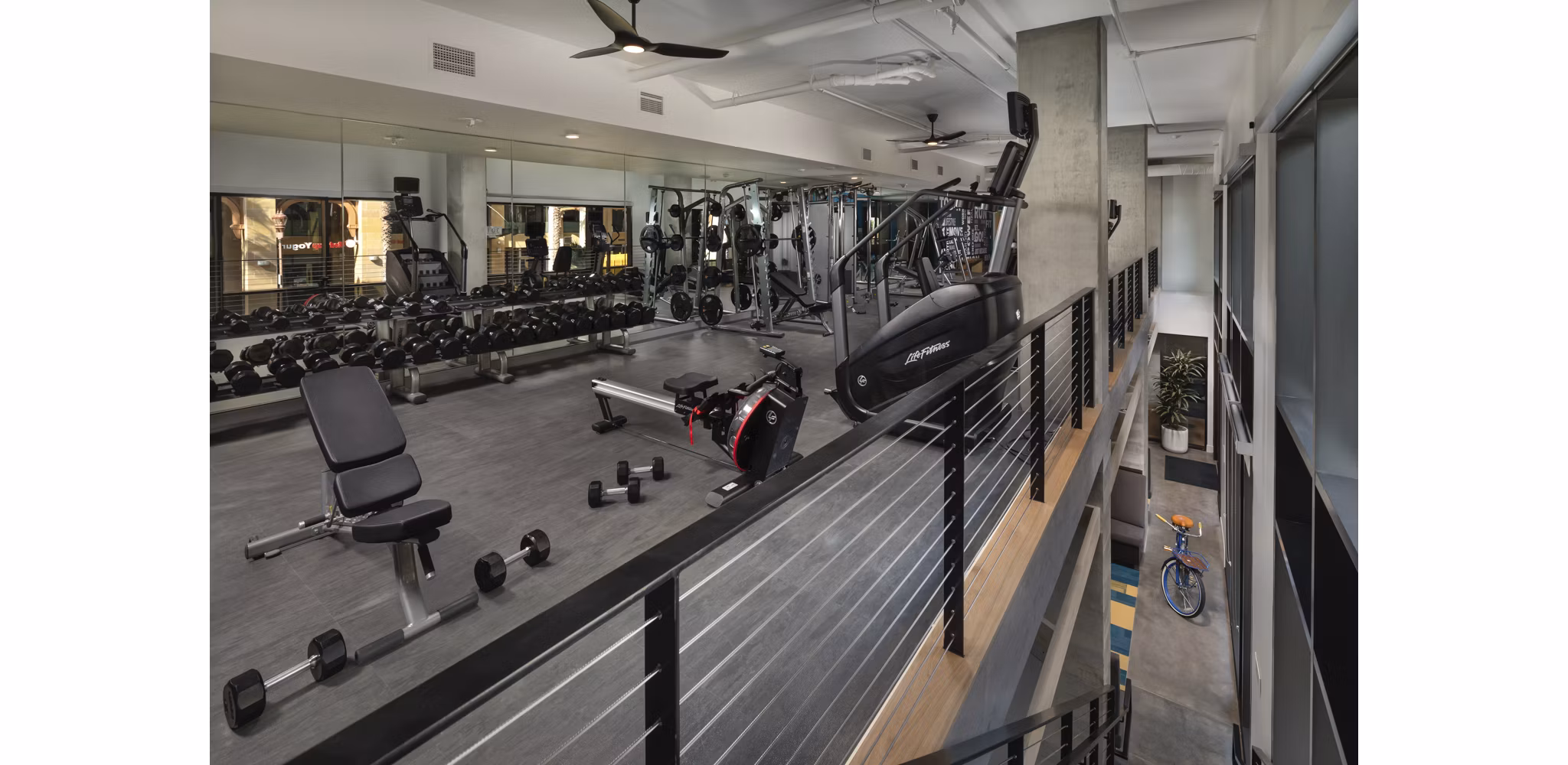 Modern fitness center with state-of-the-art equipment at Pierside South Apartments near the waterfront