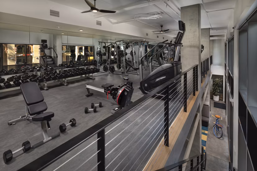 Modern fitness center with state-of-the-art equipment at Pierside South Apartments near the waterfront