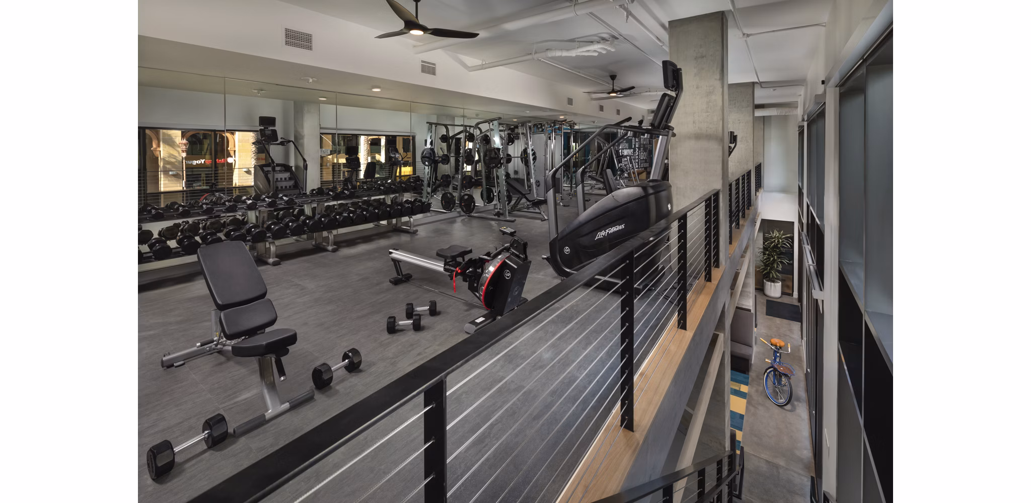 Modern fitness center with state-of-the-art equipment at Pierside South Apartments near the waterfront