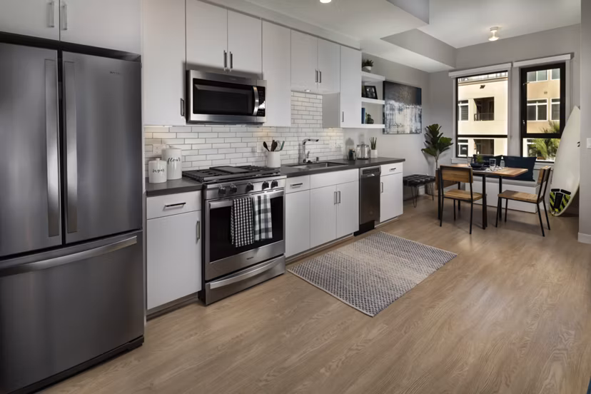 Modern kitchen with stainless steel appliances in Pierside South Apartments, Long Beach