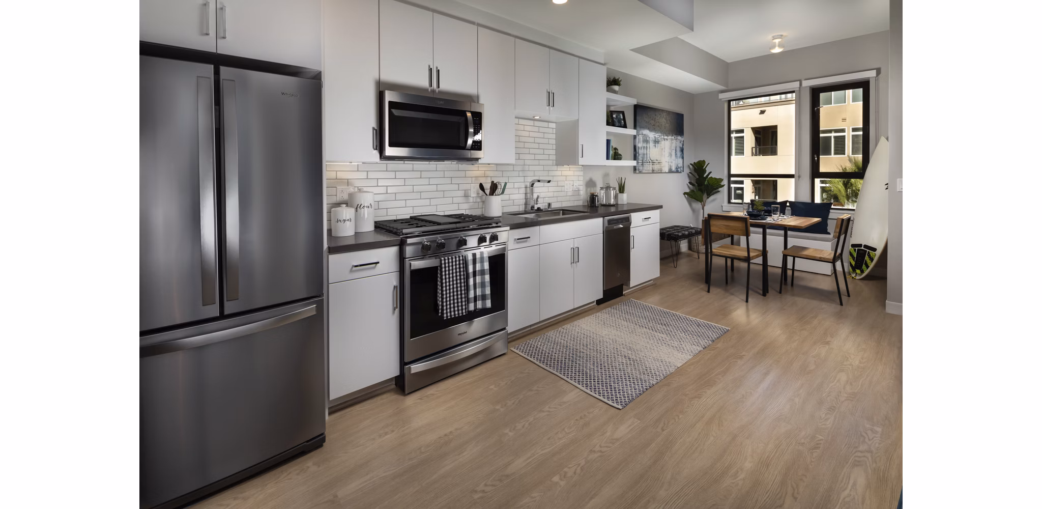 Modern kitchen with stainless steel appliances in Pierside South Apartments, Long Beach