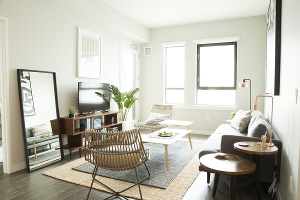Living room with stylish decor and ocean views at Pierside South luxury apartments