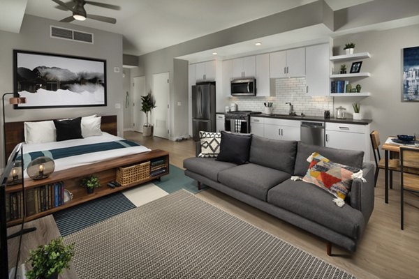 Cozy studio living room with contemporary decor at Pierside South Apartments