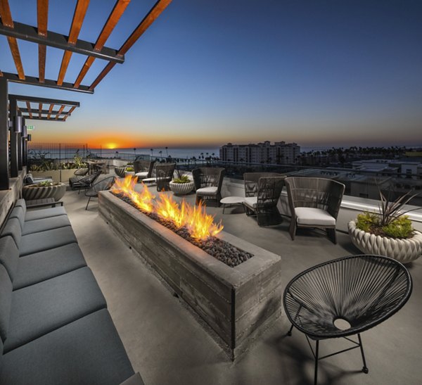 Patio area at Pierside South Apartments featuring cozy seating and ocean views in Huntington Beach
