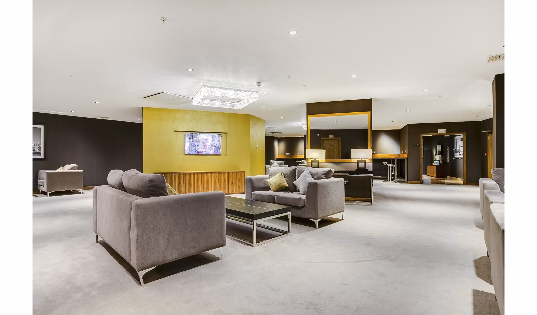Modern clubhouse with lounge seating at Nine Elms luxury apartments