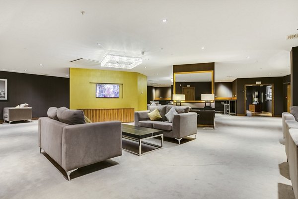 Modern clubhouse with lounge seating at Nine Elms luxury apartments