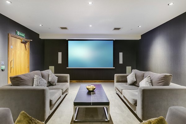 Modern clubhouse with stylish seating and open spaces at Nine Elms luxury apartments, ideal for social gatherings and events