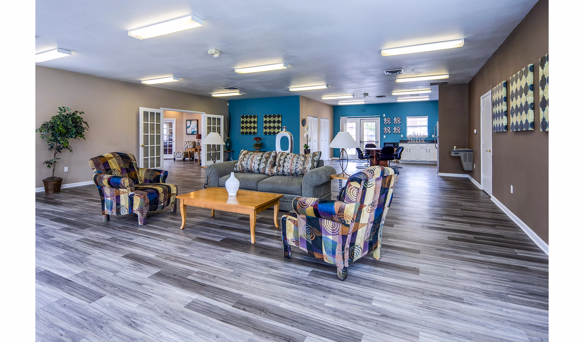 Clubhouse lobby featuring modern design and seating area at Allison Pointe Apartments