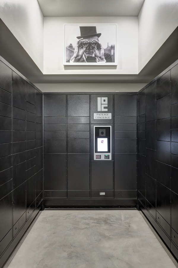 Mail room with secure parcel lockers at Alexan West Highland luxury apartments
