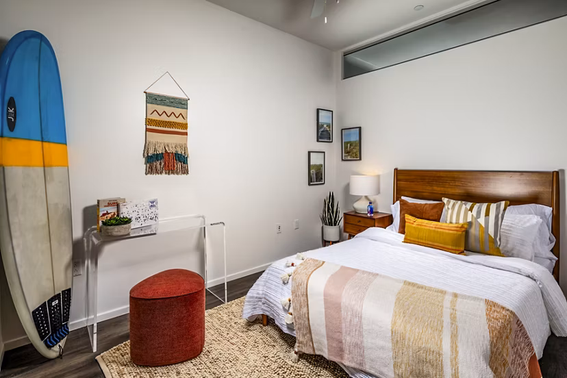 Modern bedroom with elegant furnishings at Burano Place Apartments