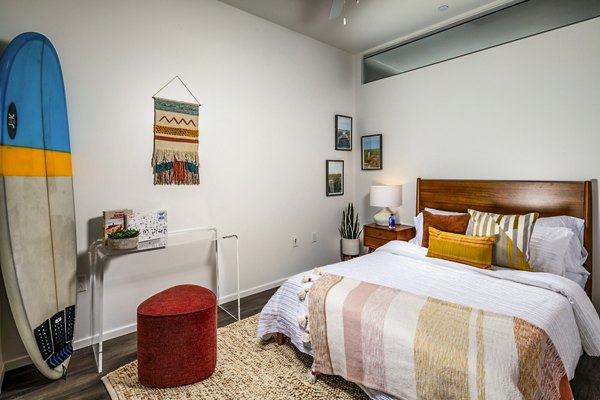 Modern bedroom with elegant furnishings at Burano Place Apartments