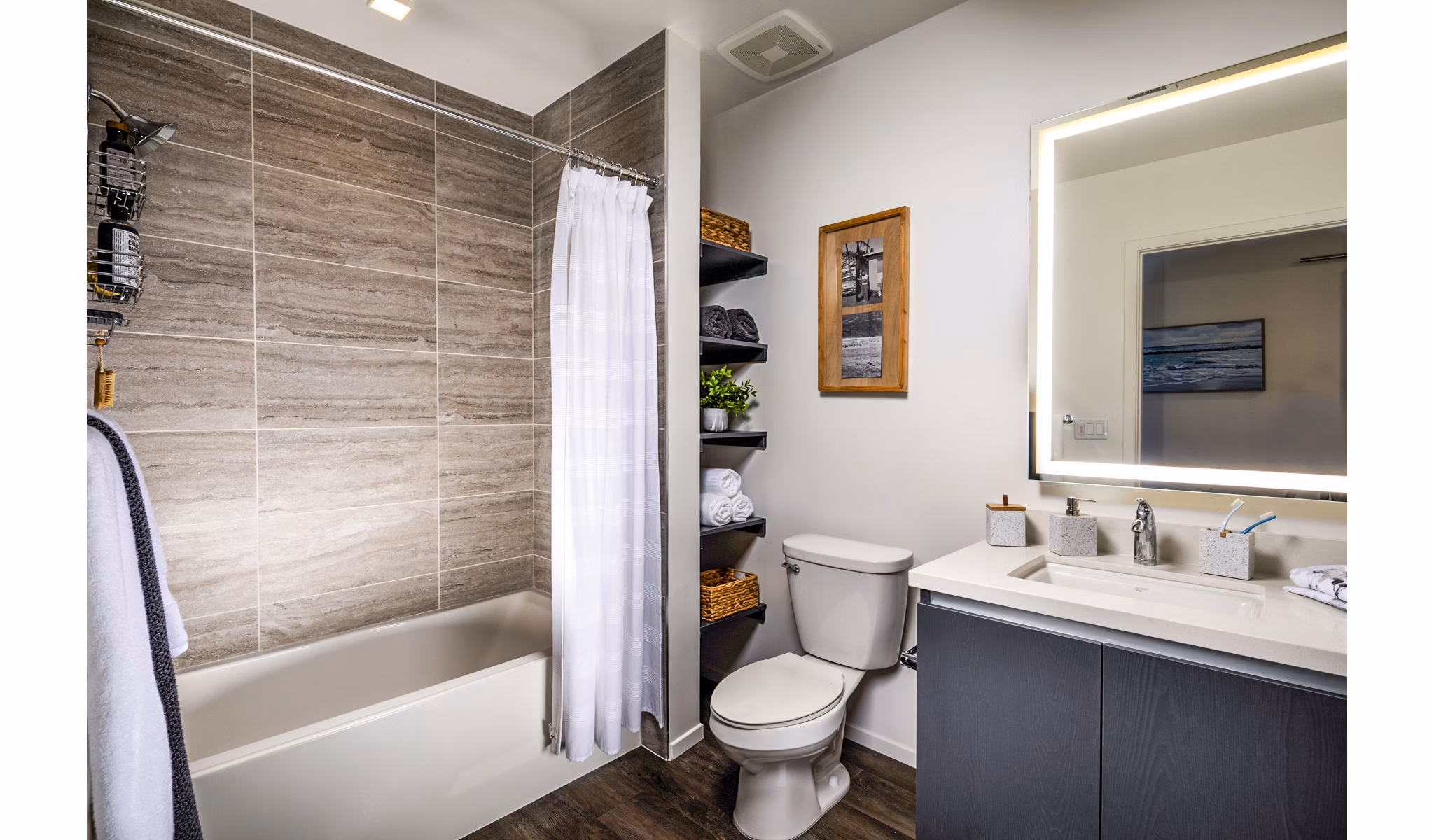 Bathroom with elegant marble countertops and modern fixtures in Burano Apartments