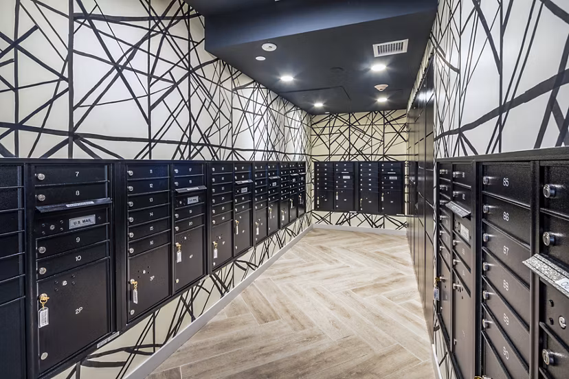 Clubhouse mail room with modern design and organized mailboxes in Burano Apartments