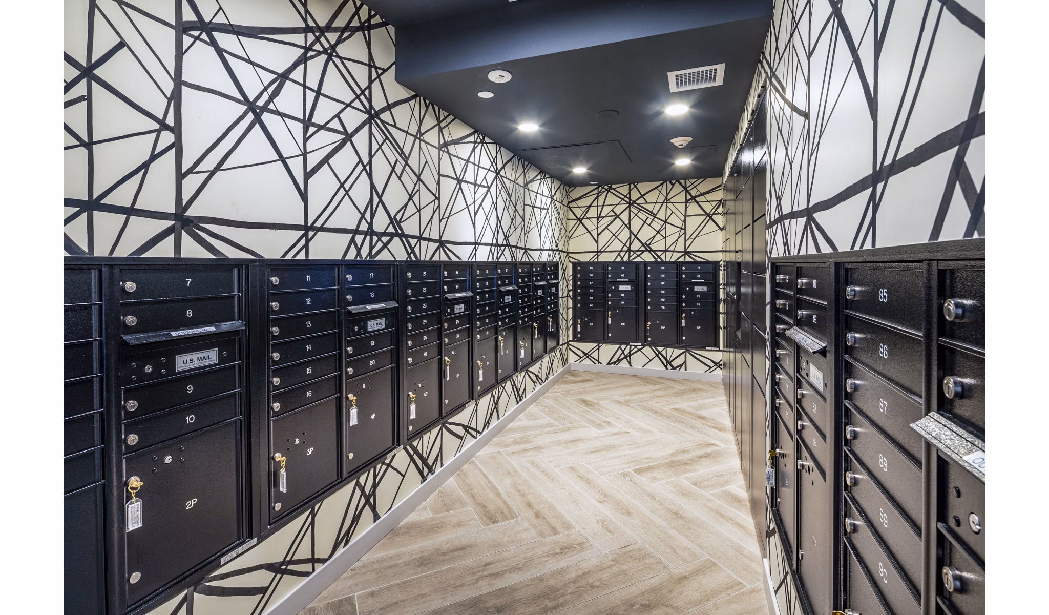 Clubhouse mail room with modern design and organized mailboxes in Burano Apartments
