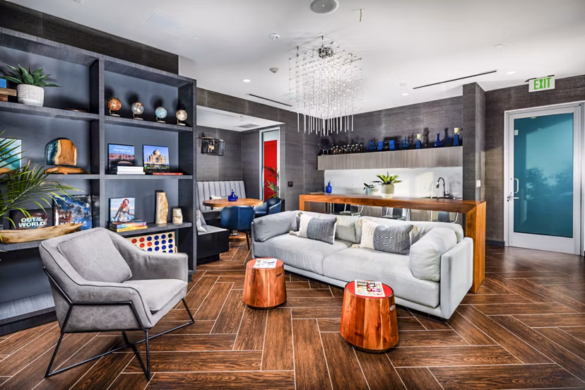 Clubhouse with modern design at Burano Apartments offering luxury amenities, indoor seating, and entertainment spaces