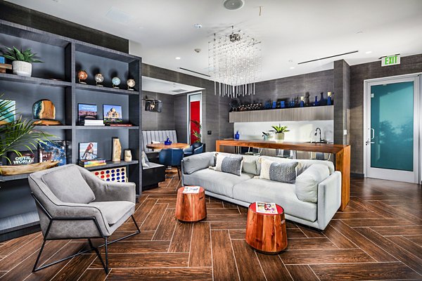 Clubhouse with modern design at Burano Apartments offering luxury amenities, indoor seating, and entertainment spaces