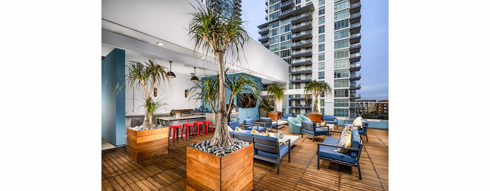 Outdoor patio with fire pit at Burano Apartments for luxury living in a modern setting