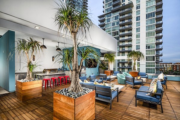 Outdoor patio with fire pit at Burano Apartments for luxury living in a modern setting