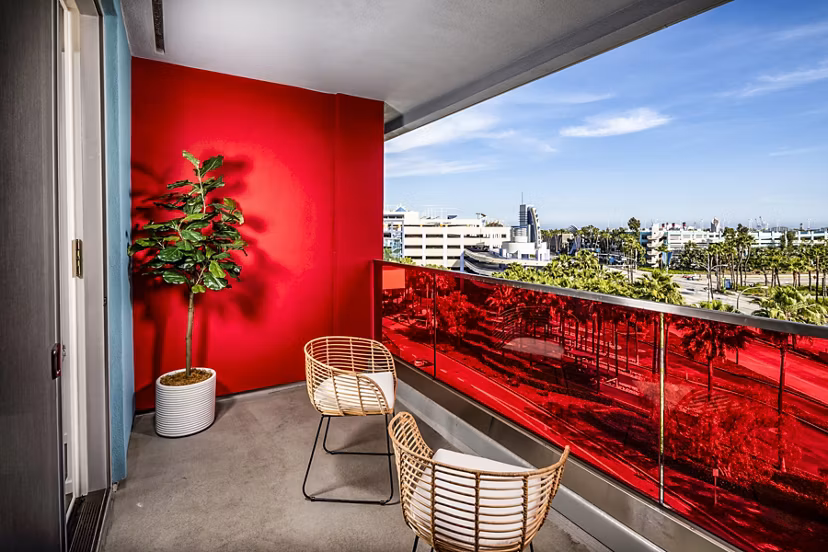 Scenic balcony with modern furniture at Burano Apartments offering city views