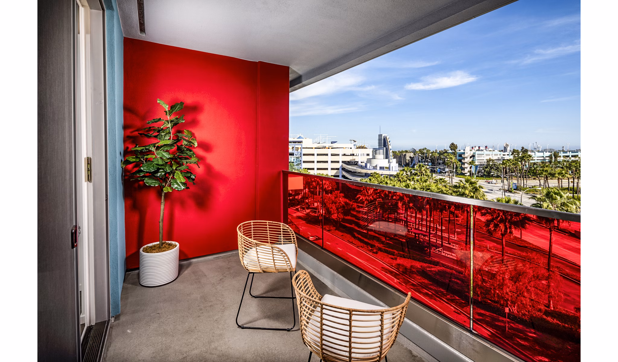 Scenic balcony with modern furniture at Burano Apartments offering city views