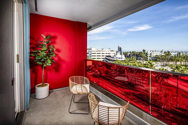 Scenic balcony with modern furniture at Burano Apartments offering city views