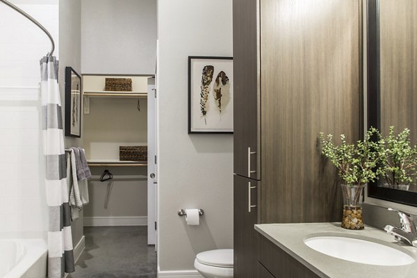 Modern bathroom with sleek fixtures at The Arnold Apartments