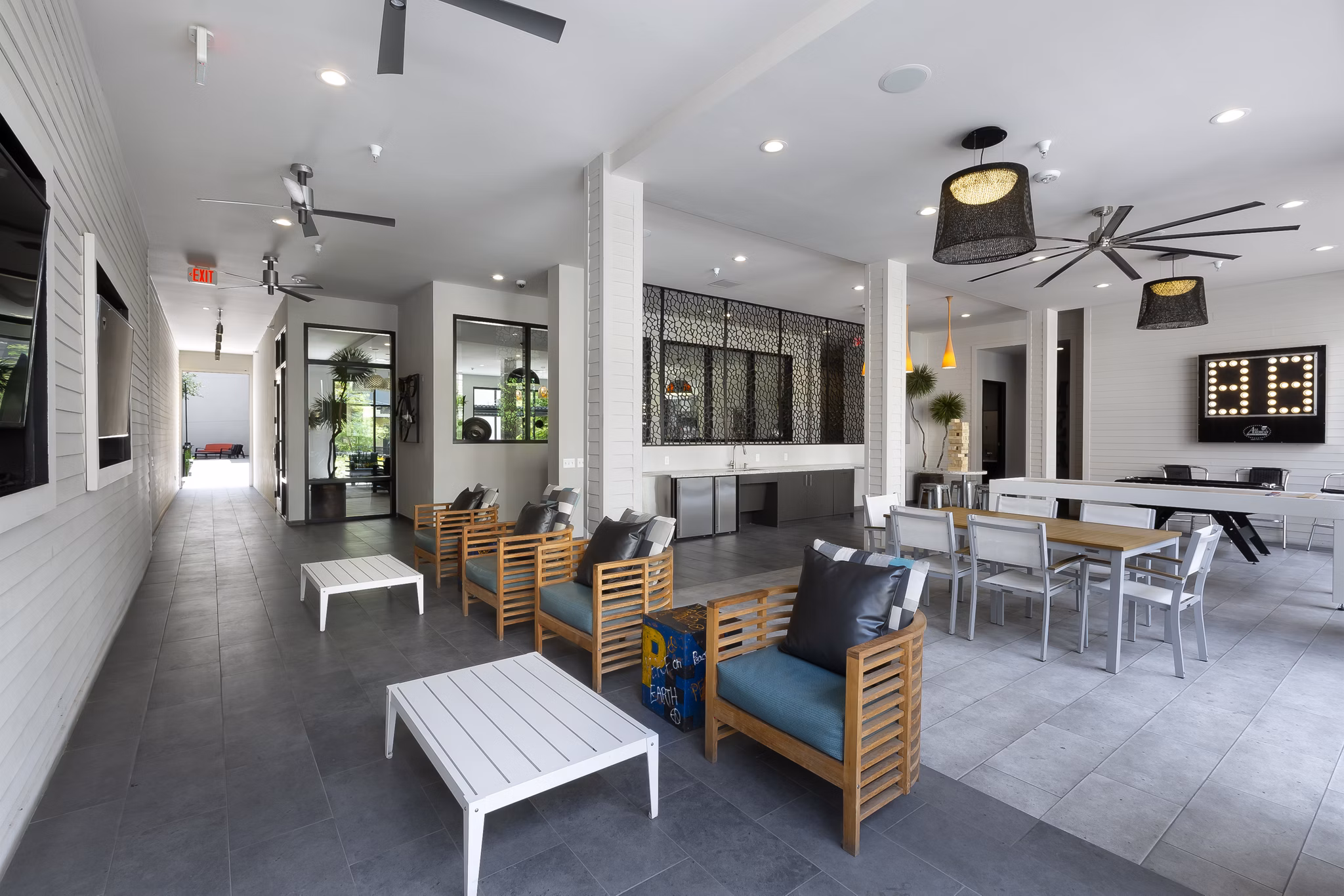 Clubhouse featuring modern design and social seating at The Arnold Apartments