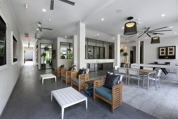 Clubhouse featuring modern design and social seating at The Arnold Apartments