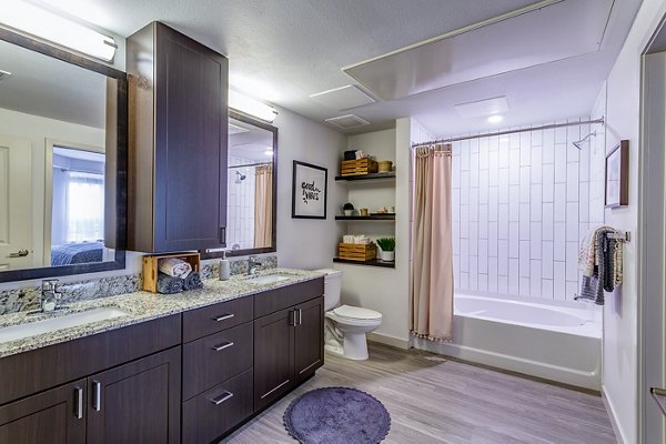 Modern bathroom with sleek fixtures at Venue on 16th Apartments, offering luxury living in a prime location