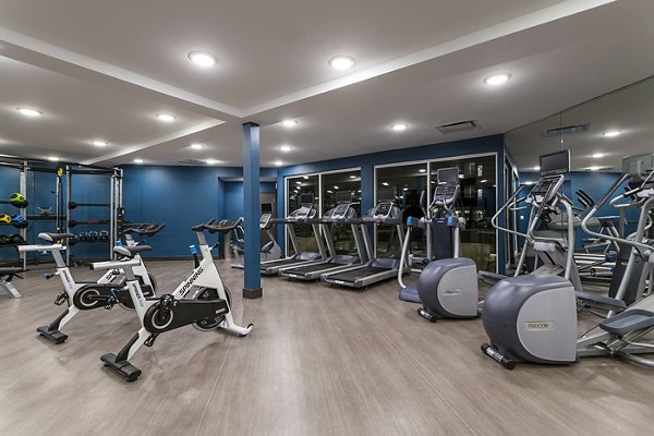Modern fitness center with state-of-the-art equipment at Venue on 16th Apartments, perfect for residents seeking an active lifestyle