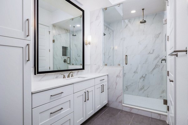 Modern bathroom with sleek fixtures at Flatiron Domain Apartments, luxury home in an urban setting designed for comfort and style